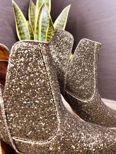 NOTHING quite says 'I'm here for the party' like a pair of glitter booties. Rubber heel and sole. 3 inch heel Fit true to size, if you are in between sizes, go with your larger size. If your foot is wide at all, also size up. Athleisure Tops, 3 Inch Heels, Waterproof Jewelry, Denim Leggings, Romper Dress, Rubber Heels, Outerwear Women, Hat Hairstyles, Ankle Booties