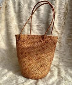 Are you looking for a versatile and stylish accessory to add to your everyday look? Get rattan bags with free shipping all over the USA. Shop now! Straw Bucket Bag For Daily Use, Palm Leaf Straw Bag With Bamboo Handle, Daily Use Straw Bucket Shoulder Bag, Daily Use Straw Bucket Bag, Daily Use Straw Bag In Bucket Shape, Daily Use Straw Bucket Bags, Casual Rattan Shoulder Bag With Bamboo Handle, Casual Brown Straw Bag With Bamboo Handle, Brown Straw Bucket Shoulder Bag