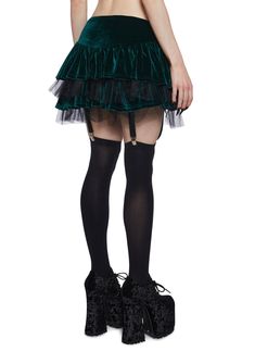 Leave them infatuated with this mini skirt that has a velvet construction with a tulle underskirt, a tiered ruffled design, with attached garters, and an elastic waistband. Green Clothes, Tulle Underskirt, Fluffy Skirt, Tiered Mini Skirt, Velvet Mini Skirt, Green Outfit, Extra Fabric, Green Skirt, Cool Clothes