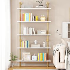 a living room filled with furniture and bookshelves next to a white couch in front of a window