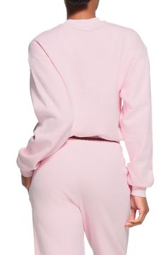 You'll want to lounge all day in this supersoft fleece hoodie in a comfy, classic silhouette from Kim Kardashian's SKIMS. 22" length (size Medium) Fixed, double-lined hood Dropped shoulders Ribbed cuffs and hem Kangaroo pocket 70% cotton, 30% polyester Machine wash, dry flat Imported French Terry Loungewear Hoodie, Cozy Hoodie With Ribbed Cuffs For Lounging, Athleisure Sweats With Drawstring Hood For Lounging, French Terry Tops With Ribbed Cuffs, Comfy Crew Neck Hoodie For Loungewear, Cozy Fit Crew Neck Hoodie For Loungewear, Fleece Sweats With Elastic Cuffs For Loungewear, Comfy Sweatshirt With Drawstring Hood For Loungewear, Hooded Sweats With Ribbed Waistband For Loungewear