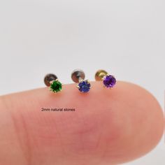 Metal: 14k solid gold, Not Plated or Filled Available Gold color: Yellow gold  Stone: Amethyst, Blue Sapphire, Tsavorite (all of them are natural stone) Thickness: 0.82mm(20G)  Stamp:14k on top and gold push back, no stamp on titanium back, ★ Stone size, 2mm  ★Threadless Push Pin (Flat Back) ★ We have two different materials of Push back for you choose: ● One is 14k solid gold with length : 6mm(standard), 8mm, 10mm (long)  ● Another is implanted grade titanium push back in size 5mm(short) 6mm 8m Nickel-free Yellow Gold May Birthstone Jewelry, Nickel-free Yellow Gold Jewelry For May Birthstone, Nickel Free Yellow Gold Jewelry For May Birthstone, Yellow Gold Tanzanite Jewelry With Birthstone, Purple Internally Threaded Jewelry As A Gift, Purple Internally Threaded Jewelry Gift, Dainty Tanzanite Birthstone Jewelry, Hypoallergenic 14k Gold Green Jewelry, Hypoallergenic Green 14k Gold Jewelry