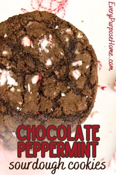 chocolate peppermint sourdough cookies with white sprinkles on top