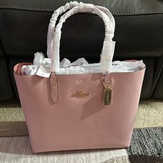 Color: Light Pink Leather Purse Packing, Light Color Palette, Pink Coach Purse, Pink Coach Purses, High End Handbags, My Christmas Wishlist, You Get Me, Strawberry Girl, Trendy Purses