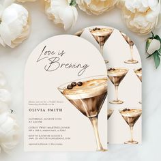 an elegant champagne brunch birthday party with roses and flowers on the side, including two martini glasses