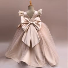 a dress with a bow on the back