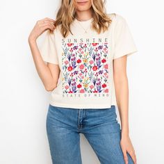 Looking for a cute versatile top to wear? Make sure to grab one of our Graphic Tees! This soft and comfortable graphic Tee is the perfect top for any outfit. It can be paired with biker shorts, jeans, or even a simple skirt/dress! This Tee is true-to-size, so be sure to order your regular t-shirt size! If you are looking for a more oversized look, make sure to size up! Spring Graphic Tee Cotton Tops, Spring Cotton Graphic Tee Tops, Everyday Short Sleeve Printed Tops, Everyday Printed Short Sleeve Tops, Everyday Printed Tops With Short Sleeves, Cotton Graphic Print Top For Day Out, Graphic Print Cotton Top For Day Out, Cotton Top With Graphic Print For Day Out, Cream Relaxed Fit Top For Day Out