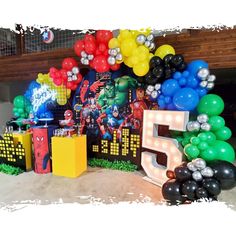 a birthday party with balloons and decorations