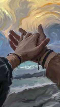 two hands reaching for each other in front of a painting