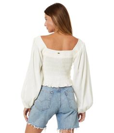 Amp up your everyday look by wearing the Rip Curl™ Talia Long Sleeve Top. The pull-on style top has a wide square neckline, full puffed sleeves, a smocked body, and a straight ruffled hemline. The elegant top blends well with the shorts or denims for an effortless everyday look..67% cotton, 31% viscose, 2% modal..Machine wash, line dry..Imported..Product measurements were taken using size SM. Please note that measurements may vary by size..Measurements: Length: 18 in Heeled Rain Boots, High Heel Rain Boots, Women's Blouses, Women Long Sleeve Tops, Puffed Sleeves, Rip Curl, Dress With Boots, Women's Tops, Square Neckline