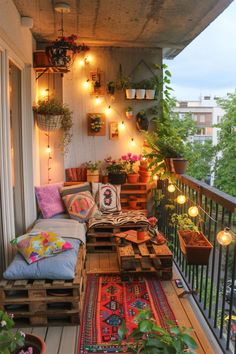 the balcony is decorated with plants and lights