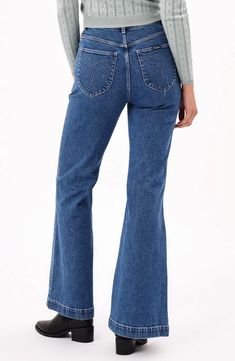 Front patch pockets and flared legs dial up the throwback charm of low-stretch flare jeans finished with a faded, vintage-inspired wash. 32" inseam; 25" leg opening; 11 1/2" front rise; 15 1/2" back rise (size 29) Zip fly with button closure Front patch pockets; back patch pockets 97% cotton, 2% polyester, 1% elastane Machine wash, line dry Imported Medium Wash Mid-rise Flares With Five Pockets, Mid-rise Medium Wash Flares With Five Pockets, Retro High Rise Denim Flares, Casual Blue Flares With Five Pockets, Retro Fitted Flares In Medium Wash, Faded Flare Jeans With Five Pockets, Retro Denim Blue Flared Denim Pants, Retro Denim Flare Jeans, Retro Denim Blue Flares