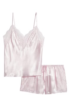 Delicate lace trims these satiny pajamas that pair a camisole and shorts for a romantic slumber. Top= 14 1/2" center front length; bottom= 2 3/4" inseam; 26" leg opening; 10" front rise; 13 1/2" back rise (size Medium) Top has V-neck; adjustable straps Shorts have drawstring waist 100% polyester Machine wash, tumble dry Imported Slippers Outfit, Cute Pajama Sets, Cami Set, Cute Pajamas, Cute Fit, Weekend Outfit, Pajama Shorts, Material Girls, Comfortable Outfits