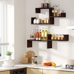 the shelves in the kitchen are filled with spices and condiments