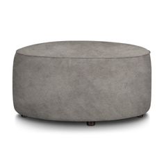 an ottoman that is made out of concrete