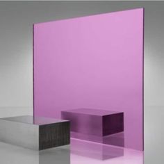 an abstract purple and black object on a reflective surface