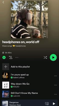 an iphone screen with the words headphones on, world off and music playlist