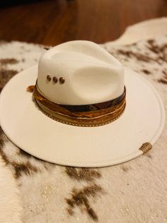 One of a kind custom made cowgirl western boho hats. No two hats are the same. Cream Brimmed Hat For Rodeo, Cream Wide Brim Hat For Rodeo, Adjustable Hats For Ranch And Fall, Adjustable Hats For Ranch And Fall Season, Adjustable Hats For Ranch In Fall, Western Adjustable Hats For Fall, Adjustable Hats For Ranch In Fall Season, Cream Flat Brim Hat For Rodeo, Southwestern Wide Brim Felt Hat For Western-themed Events