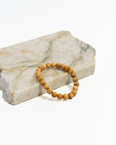 Discover the perfect blend of beauty and protection with our exclusive gift set & bracelet stack, featuring three distinct malas: Blue Tiger's Eye Mala, Blue Gold Tiger's Eye and Palo Santo Mala, and Palo Santo Diffuser Mala. This elegant set is designed to ward off negative and toxic energy while adding confidence, protection, & a touch of sophistication to your style. Features: Blue Tiger's Eye Mala: This rare and coveted stone is known for its protective properties, shielding you from negativ Spiritual Wooden Beads Jewelry For Everyday, Spiritual Wooden Beads Stretch Bracelet For Everyday, Spiritual Stretch Bracelet With Wooden Beads For Everyday, Natural Round Beads Bracelets As Gift, Holistic Wooden Beads Bracelets For Meditation, Holistic Wooden Beads Healing Bracelet, Natural Round Beaded Bracelets For Gift, Natural Round Beaded Bracelets As Gifts, Gift Beaded Bracelets With Round Beads