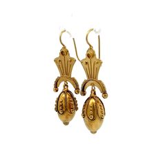 Step back in time with these exquisite Victorian drop earrings, truly a treasure from the 19th century. Crafted in 15 karat yellow gold, these antique earrings showcase the ornate detailing characteristic of the Victorian era. Each earring features intricate scrollwork and hollow elements that contribute to their lightweight feel, making them comfortable for all-day wear. These elegant drop earrings are perfect for anyone who appreciates the beauty of antique jewelry and the rich stories they ho Luxury Victorian Yellow Gold Pearl Earrings, Luxury Yellow Gold Victorian Pearl Earrings, Formal Brass Jewelry With Historical Design, Antique Gold Jewelry With Historical Design, Elegant Antique Gold Jewelry With Historical Design, Traditional 14k Gold Drop Earrings, Antique Earrings With Historical Design For Ceremonial Occasions, Classic 22k Gold Hallmarked Earrings, Classic Hallmarked 22k Gold Earrings