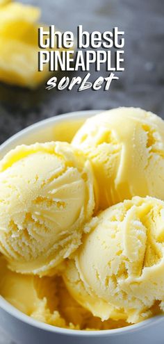 the best pineapple sorbet is in a white bowl with two scoops