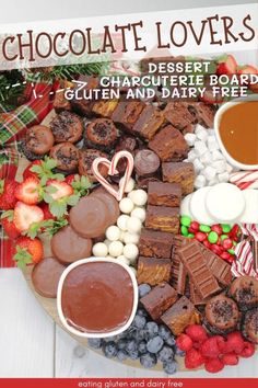 chocolate lover's dessert board with candy, marshmallows, pretzels and other treats