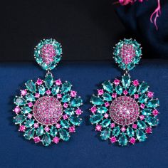 CZ Jewelry- Brand Designer Shiny Rose Red CZ Stone Big Round Flower Statement Dangle Earrings for Women Engagement Party Jewelry E553Model Number:4001006389609 ◆Style: Big Round Flower Statement Dangle Earrings for Women◆Metal Material: Copper (Lead and Nickel free)◆Metal Color: Black Gold◆Stone Material: Cubic Zirconia ◆Stone Color: Hot Pink,Light Blue★Earrings Size: 4 cm Valentine's Day Party Flower Earrings For Pierced Ears, Elegant Multicolor Earrings For Valentine's Day, Rose Red Flower Drop Earrings, Rose Red Flower Shaped Earrings For Party, Elegant Multicolor Flower Earrings For Parties, Rose Red Drop Earrings For Party, Elegant Rose Red Flower Earrings For Party, Elegant Rose Red Earrings For Party, Rose Red Dangle Earrings For Party