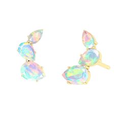 PRICES MAY VARY. Elegant Design: Featuring six pear-shaped Ethiopian opals, these stud earrings shine with a captivating play of colors perfect for any occasion. Versatile Sizes: Each earring is carefully crafted with opals in three sizes (7x5 mm, 6x4 mm, 5x3 mm) set in a prong setting for a secure and stylish look. Compact and Comfortable: With a total size of 13.80 mm, these earrings are designed to be both comfortable for daily wear and striking for special occasions. High-Quality Material: C Fire Opal Earrings, Opal Stud Earrings, Opal Earrings Stud, Gemstone Stud Earrings, Opal Studs, Earring Gift, Earring For Women, Gemstone Studs, Stud Earrings For Women