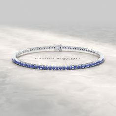 Unveil the captivating brilliance of our exquisite 3.14-carat Natural Blue Sapphire Tennis Bracelet, available in 14K or 18K Solid Gold. Each sapphire showcases an alluring blue hue, illuminating your wrist with unparalleled elegance. As the September birthstone, it symbolizes wisdom and truth, making it a meaningful gift this Thanksgiving. Perfect for layering or as a cherished present for special occasions, this personalized bracelet is a timeless treasure to celebrate gratitude and love. 𝐅𝐞 Luxury Sapphire Diamond Round Bracelet, Luxury Sapphire Diamond Bracelet, Luxury Sapphire Gemstone Tennis Bracelet, Luxury Blue Diamond Bracelet With Brilliant Cut, Blue Diamond Bracelet With Brilliant Cut Luxury Style, Sapphire Tennis Bracelet Fine Jewelry With Prong Setting, Blue Diamond Jubilee Tennis Bracelet, Luxury Sapphire Tennis Bracelet With Brilliant Cut, Sapphire Tennis Bracelet With 17 Jewels