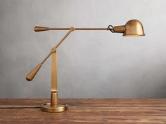 A modern take on a classic style, our Colson Task Table Lamp exudes functional beauty. Crafted from steel in a polished brass finish, Colson's simplistic design is complemented by subtle, decorative details creating an elevated lighting solution. Root Table, Budget Furniture, Handmade Chandelier, Arhaus Furniture, Tool Room, Condo Remodel, Table Bedside, Bedside Lamps, Wall Art Wallpaper