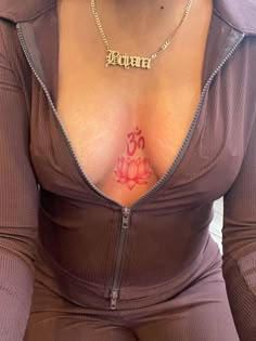 a woman with a tattoo on her chest