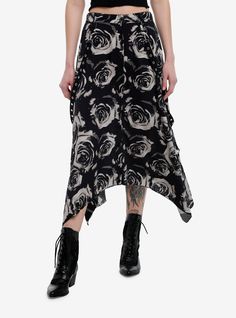 Make your look blossom in this hanky hem midi skirt! Featuring an allover black and grey rose design  plus removable grommet straps on the sides. Comes with a half elasticated waistband and buttons down the front.Please note: Style is fitted with no stretch; size up for a looser fit.100% rayonWash cold; dry flatLength: 31''ImportedListed in junior sizesModel is 5'10''Model wears size Small Corporate Emo, Cutesy Halloween, Whimsigoth Style, Black And Grey Rose, Goth Skirt, Corporate Goth, Hot Topic Dresses, Skirt Sewing Pattern, Skirt Sewing