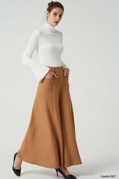 "This fashion brown wide leg pants is designer from XIAOLIZI. The long wool pants made high waisted + back zipper closure + front two up entry pockets + many front pleated add to the wide leg cut of our maxi pant, makes the warm pants more fashionable and warm in winter, it's elegant and classic womens pants, come on! Your wardrobe should have it. DETAIL * Made from Wool fabric, polyester lining * back zipper closure * two up entry pockets * winter pant, warm pant, long pants, maxi pants CUSTOM Beige Wide Leg Wool Pants, Wide Leg Beige Wool Pants, Modern Straight Pants For Winter, Beige Wool Wide Leg Pants, Chic Beige Wool Pants, Elegant Wool Wide Leg Pants For Winter, Brown Wide Leg Cargo Pants For Fall, Chic Brown Wide Leg Full-length Pants, Chic Brown Wide Leg Full Length Pants