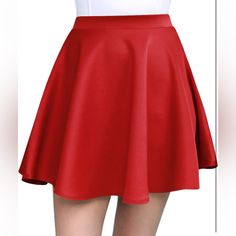 Basic Versatile Stretchy Flared Casual Mini Skater Skirt This Red Skater Skirt Has Aline Silhouette, Elastic Waistband. Fit And Flare Enough For Casual Wear. This Versatile Skirt Is A Trendy Item In The Wardrobe. 90% Polyester, 10% Spandex Casual A-line Mini Skirt For Parties, Party Flared Mini Skirt In Solid Color, Red Stretch Skirt For Fall, Red A-line Bottoms For Party, Red A-line Party Bottoms, Red Skirted Bottoms, Solid A-line Mini Skirt For Parties, Red Pleated Skort For Parties, A-line Mini Skirt For Party