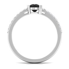 a black and white diamond engagement ring on a white background with the center stone in the middle