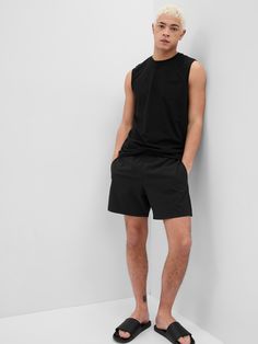 Smooth stretch nylon swim shorts.  Drawcords at waist.  Front slant pockets.  Back snap button flap pocket.  Certain styles have allover prints.  Straight silhouette with a relaxed fit.  Hits at mid thigh.  6" inseam. Casual Summer Outfits, Shorts Black, Nike Adidas, Swim Shorts, Flap Pocket, Snap Button, Mens Shorts, Gap, Calvin Klein