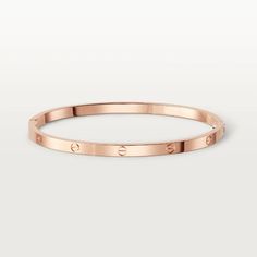 Introducing the LOVE BRACELET 3.65MM - a timeless and elegant piece that exudes sophistication and exclusivity. Crafted with the finest materials, this bracelet features a sleek 3.65mm design, perfect for adding a touch of luxury to any outfit. With its iconic design, this bracelet is the perfect way to show your love and appreciation. ADDITIONAL INFORMATION Color: Pink Gold, Silver, Gold Stone: No Ref. B6047317 Material:- 925 Sterling Silver - 18k Gold Plated- 10k Real Gold- 18k Real Gold ( con Classic Yellow Gold Cartier Bracelet, Classic Cartier Bracelet In Yellow Gold, Classic Cartier Yellow Gold Bracelets, Classic Cartier Yellow Gold Bracelet, Modern Cartier Bangle Bracelets, Modern Cartier Bangle Bracelet, Minimalist Cartier Jewelry For Formal Occasions, Modern Cartier Bangle With Jubilee Bracelet, Modern Cartier Bracelet For Formal Occasions