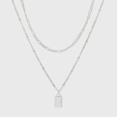 Add some layered interest to your look with this Silver Rectangle Charm Chain Necklace from A New Day™. This double layered chain necklace in a silver finish makes a versatile and stylish pick with a range of outfits. The longer chain has small beads at regular intervals along the entire length and suspends a rectangular charm accent for an elegant look. This fashion jewelry accessory fastens with a classic lobster clasp closure for secure and easy wear. Pair with a range of casual ensembles or Layered Chain Necklace, Layered Chain, Charm Chain, Small Beads, Layered Chains, Of Outfits, Light Summer, Chain Pendant, Fashion Accessories Jewelry