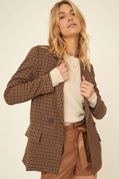 Plaid woven blazer. Notch lapel collar. Long sleeves. Button-front closure. Side pockets. Oversized loose fit. 88% Polyester / 10% Rayon / 2% Spandex. Imported. Designed in LA. Model wears size S. This item is final sale. Brown Blazer With Double Button Closure And Lapel Collar, Brown Blazer With Lapel Collar And Double Button Closure, Winter Office Blazer With Collar, Brown Double-breasted Blazer With Notch Lapel, Brown Notch Lapel Blazer With Double-breasted Button, Trendy Collared Fall Blazer, Trendy Collared Blazer For Fall, Brown Lapel Collar Blazer For Office, Brown Blazer With Lapel For Office