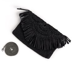 Our black raffia clutch purse bag will complete your bohemian chic look during spring summer days and evenings! You can use it as a clutch purse bag or a crossbody bag with a long chain strap. It's an everyday piece offering optimal capacity and easy carrying with a long strap to grab and go. It's also a great gift idea for your loved ones! > It is exclusively handmade ! > The main material 100% natural raffia paper yarn. > It has a long metal shoulder strap. > The dimensions of the bag are 18 c Summer Fringe Clutch Bag, Beach Clutch With Fringe, Rectangular, Trendy Beach Clutch In Pouch Style, Trendy Woven Beach Clutch, Black Bohemian Straw Bag For Vacation, Bohemian Black Straw Bag For Vacation, Bohemian Clutch Shoulder Bag For Vacation, Black Crochet Pouch Bag For Vacation, Black Woven Clutch Bag