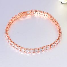 Brand New Women's Pink Rose Gold Diamond Tennis Bracelet Available In Two Sizes: Standard 7 Inch (The Most Common Women's Size) Large 8 Inch (If You Desire A Slightly Bigger Size) Width 4mm 14k Rose Gold Plated Sterling Silver Genuine 1ct Lab Created Diamonds Retail Price $350 Buy With Confidence From A Trusted Seller With A 99%+ Feedback Rating! A0196 (Id-215) Rose Gold Cubic Zirconia Bracelets With Prong Setting, Rose Gold Diamond Cut Bracelet With Cubic Zirconia, Rose Gold Cubic Zirconia Bracelet With Diamond Cut, Rose Gold Cubic Zirconia Bracelets With Diamond Cut, Rose Gold Cubic Zirconia Tennis Bracelet Gift, Elegant Rose Gold Tennis Bracelet For Anniversary, Elegant Rose Gold Cubic Zirconia Tennis Bracelet, Elegant Rose Gold Crystal Bracelet For Anniversary, Rose Gold Tennis Bracelet With Prong Setting For Wedding