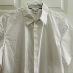 Medium Size Calvin Klein White. Nwot. In A Very Excellent Condition. No Stains Nor Marks . Smoke Free Environment. Calvin Klein Spring Everyday Tops, Calvin Klein Spring Tops For Everyday Wear, Classic Calvin Klein Cotton Tops, Classic Calvin Klein Shirt With Button Closure, Classic Calvin Klein Shirt For Summer, Classic Calvin Klein Summer Shirt, Fitted Calvin Klein Cotton Shirt, Calvin Klein Casual Collared Top, Casual Calvin Klein Collared Top