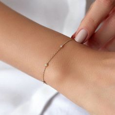 Add a touch of whimsy and sparkle to your jewelry collection with this beautiful, minimal dainty 14k solid gold bracelet. The bracelet features a series of colorful, sparkling laser cut balls in yellow gold, white gold, and rose gold, creating a playful and eye-catching effect.★ Bracelet Features• Gold Kt: 14K Solid Gold (All bracelets are stamped for authenticity)• Available Gold Color: Tricolor• Dorica Ball Diameter: 2.85 mm Solid Gold Bracelet, Stocking Fillers For Her, Forever Jewelry, Dainty Chain, Pin Jewelry, Mens Jewelry Bracelet, Fine Earrings, Cuff Earrings, Gifts For Mum