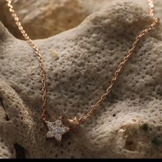 Description You will be reminded of your birth star every time you choose to wear the Estrella Minimal Necklace. It is rose gold plated in high polish with a little, twinkling star motif adding to this jewelry's celestial charm. Wear it by itself or layer it with other necklaces for a more glamorous look. Product Information Materials used: 925 Silver with White Rose Gold Plating Stones: High Grade CZ Stones Length: 21 cm and adjustable Findings: Hook and links Silver Mangalsutra, Star Motif, Minimal Necklace, Glamorous Look, Gold Polish, Silver Pendants, White Rose Gold, Black Beans, Cz Stone