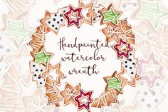 a hand painted watercolor wreath with words written in the center and decorated cookies around it