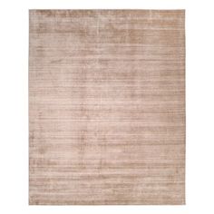 a beige rug on a white background with no one in the room to see it