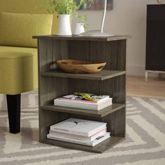 a book shelf sitting on top of a carpeted floor