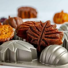 several different types of pastries on a tray