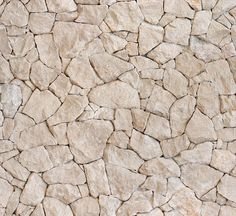 an image of a stone wall that looks like it is made out of rocks