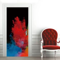 a red chair sitting in front of a door with an abstract painting on it's side